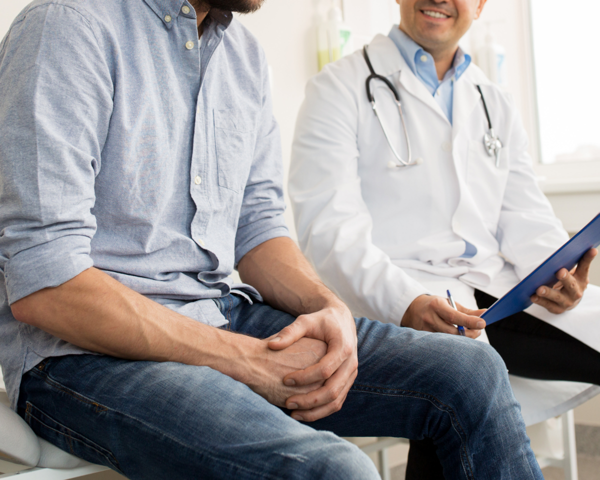 A doctor and patient collaborate on the patients health.